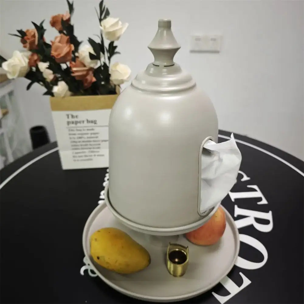 A sleek matte gray ceramic paper box tissue dispenser with rounded body and decorative finial for storage solution decorbites creative paper