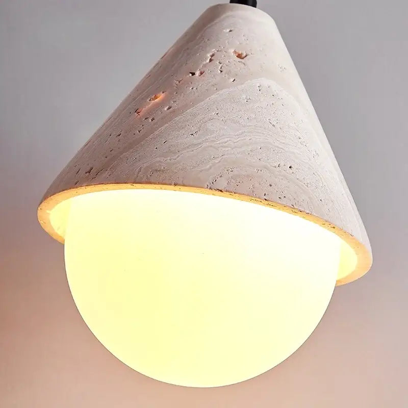 Minimalist off white concrete cone pendant light with warm glowing circular glass shade for dining room decorbites creative stone led