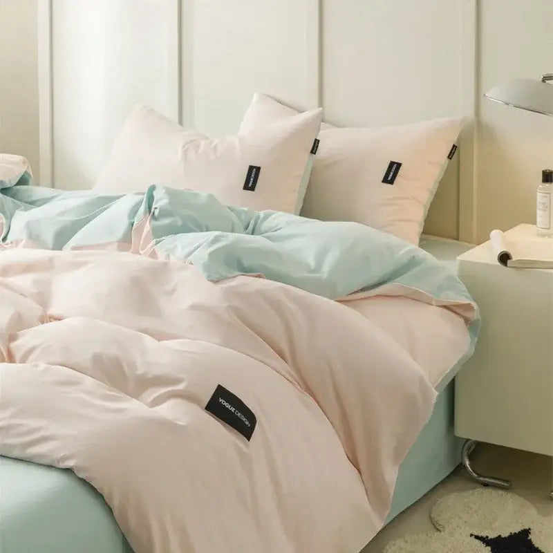 Pastel pink and mint green matching cotton bedding set with soft quilted fabric for minimalist off-white and mint bedroom