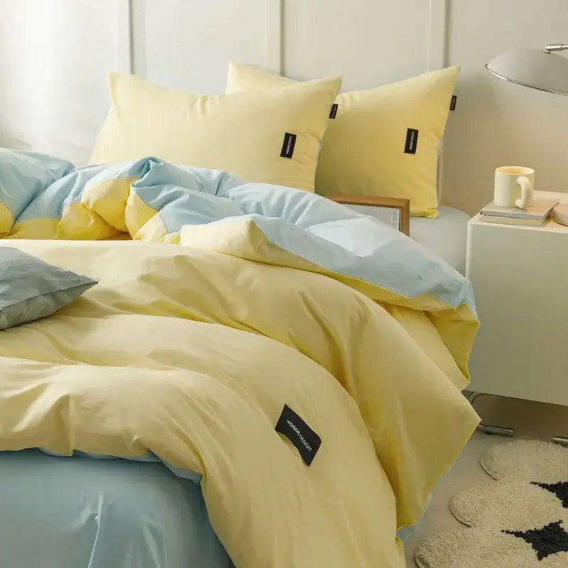Yellow and light blue duvet set with soft plush fabric in minimalist off-white and mint matching cotton bedding set