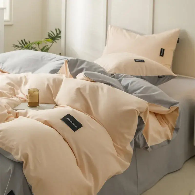 Beige and gray two-tone duvet bedding set with soft color matching cotton fabric and black woven labels for bedroom use