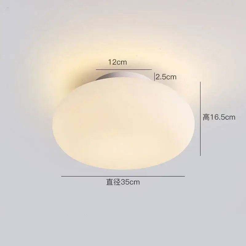 Minimalist oval white frosted glass pendant lamp with sleek metallic base for living room decorbites big ball pendant