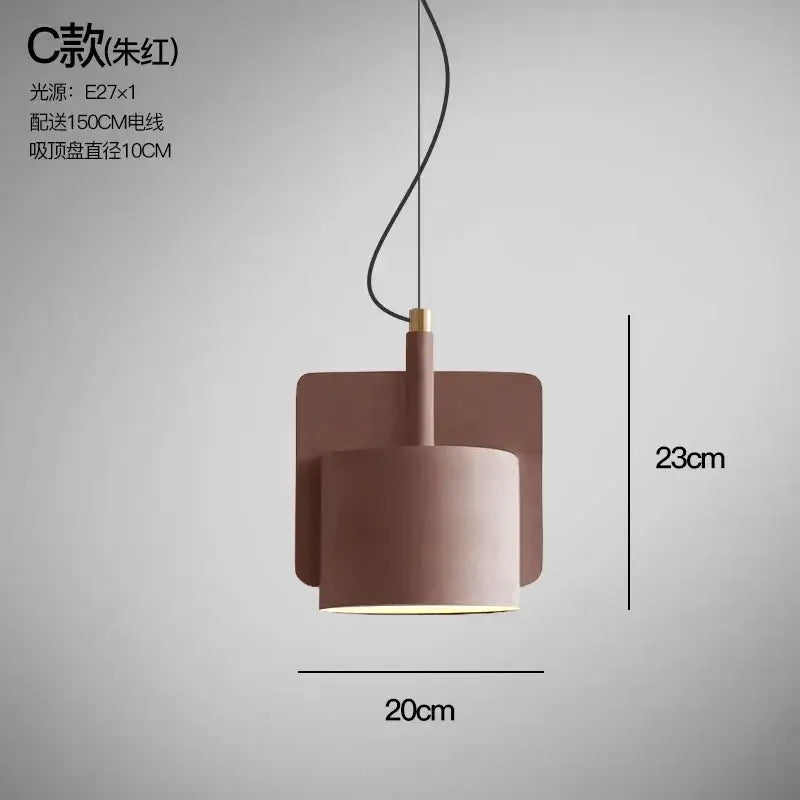 Minimalist pastel cement pendant lamp with a matte rose gold cylindrical shade by decorbites cement pendant