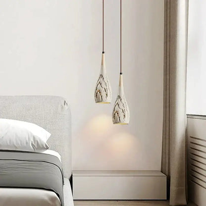 Two elegant white ceramic pendant chandelier lights with gray leaf patterns for minimalist bedroom decorbites concrete high pendant