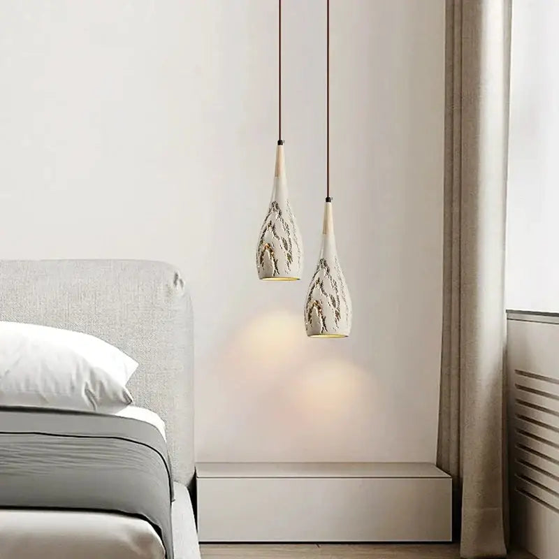 Two elegant white ceramic pendant chandelier lights with gray leaf patterns for minimalist bedroom decorbites concrete high pendant