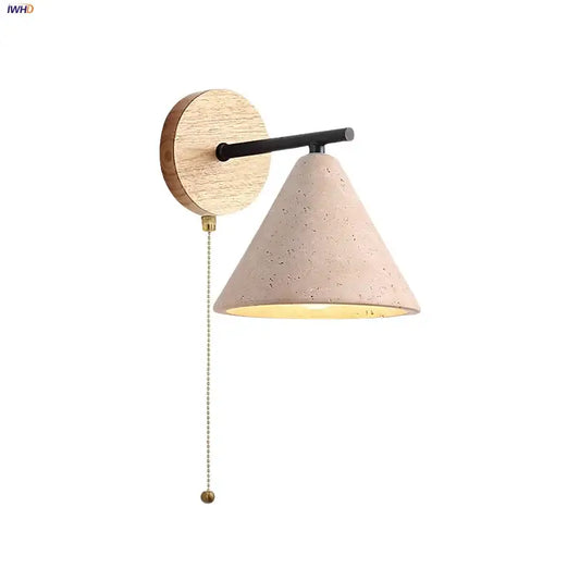 Minimalist wall lights with a light pink concrete conical shade and round wooden backplate for decorbites iron yellow travertine