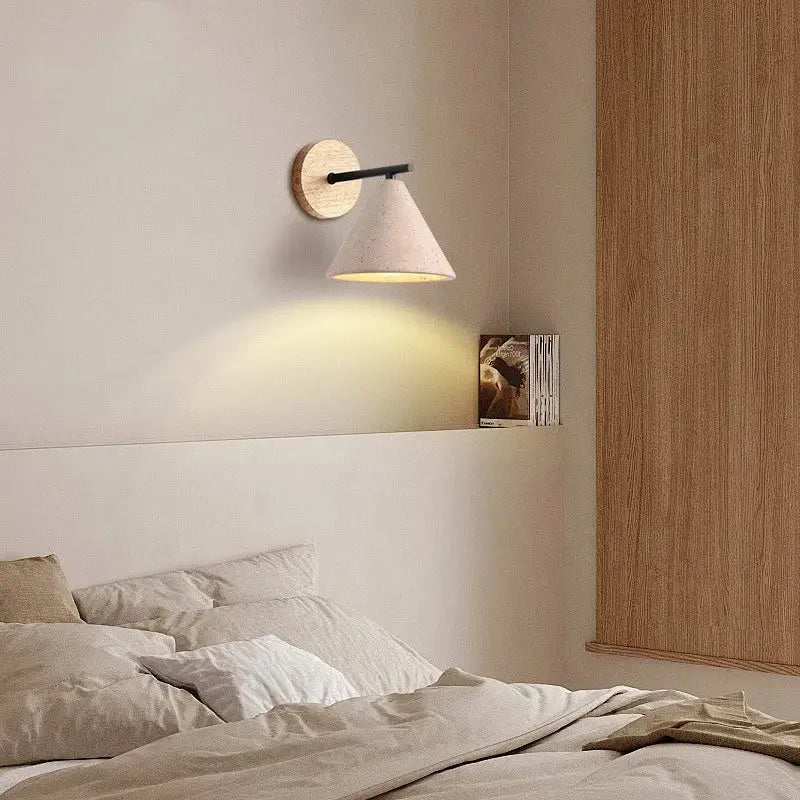 Minimalist wall lights with circular wooden backplate, black metal arm, and beige shade for yellow travertine decorbites iron yellow