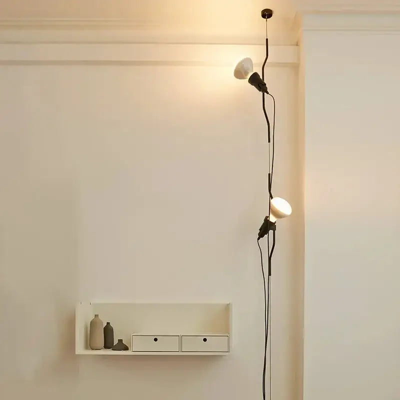 Black articulated floor lamp with three adjustable white globe bulbs in minimalist red and black decorbites adjustable led chandelier design