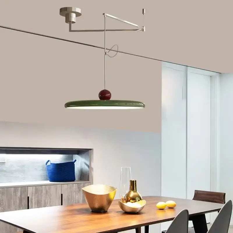 Minimalist red cream iron art pendant light with modern green circular shade and polished brass accent for bedroom decorbites cream iron