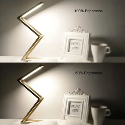 A sleek gold finish decorbites dimmable led desk lamp with modern z-shaped design for study room decor