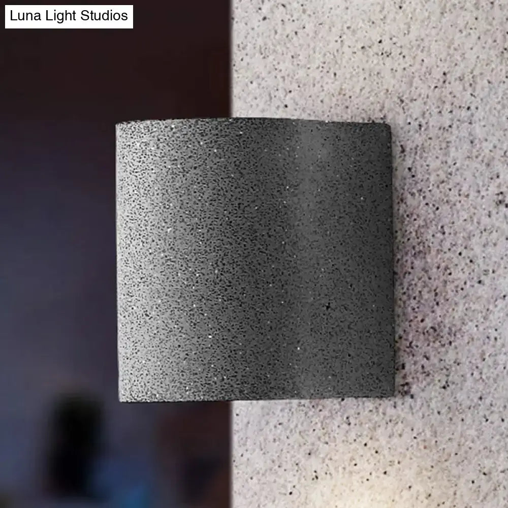 Minimalist gray speckled concrete led wall light with textured matte finish for living room wall lighting