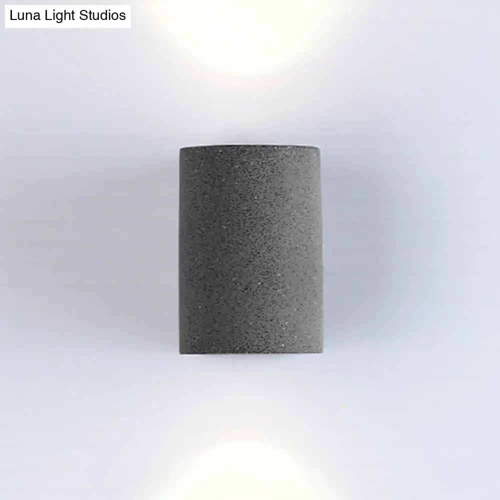 Minimalist gray speckled concrete led wall light with textured cylindrical design for living room wall light use