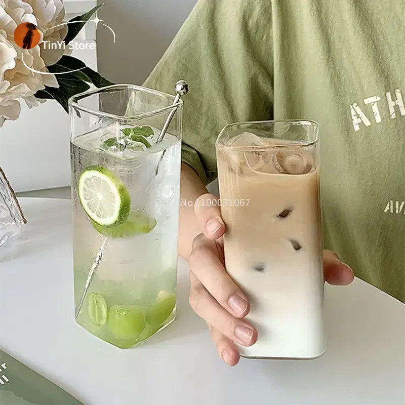 Clear rectangular glass juice cup with modern minimalist design perfect for kitchen drinkware use