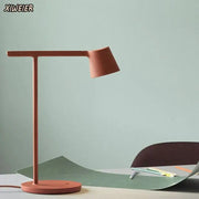 Minimalist terracotta desk lamp with adjustable nordic design and matte finish ideal for bedroom decorbites light