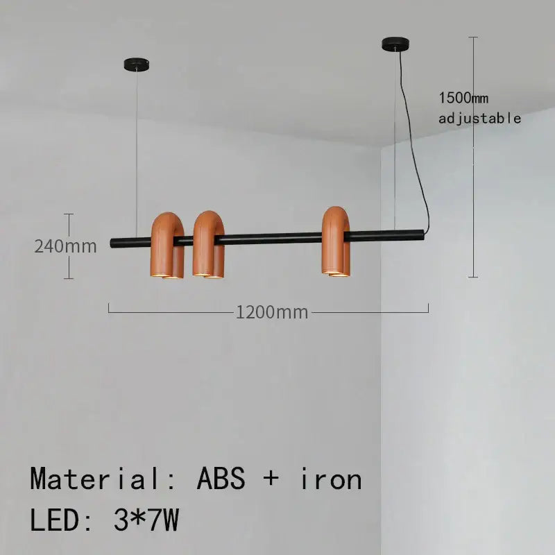Modern minimalist cirkus tube wall sconce with three warm terracotta ceramic shades on black abs and iron bar for reading light