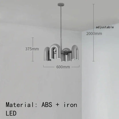 Modern silver-toned cirkus tube wall sconce with sleek industrial iron arms and curved abs for bedroom reading light