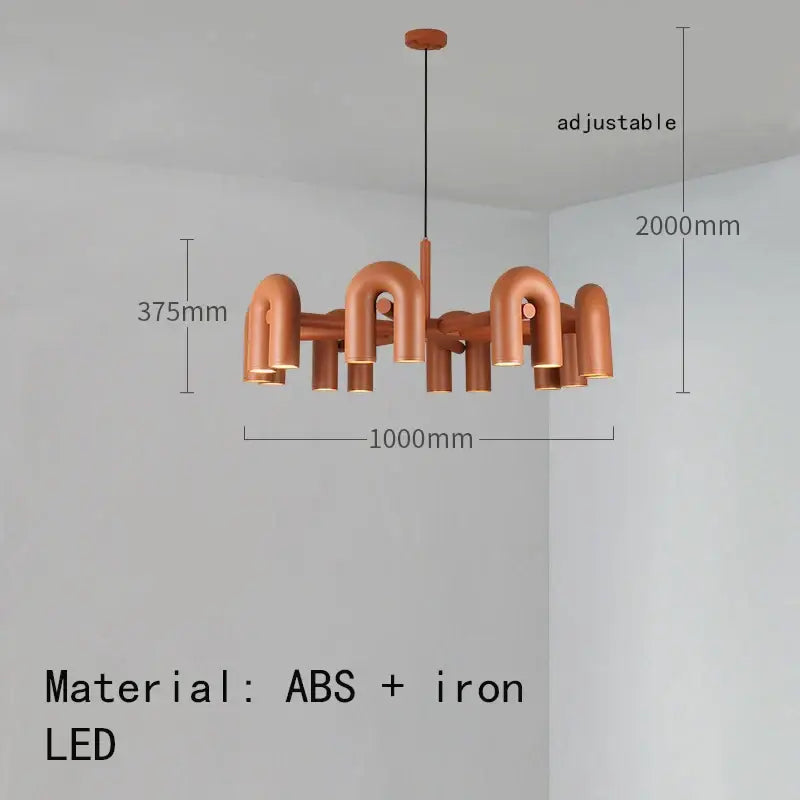 Copper-colored minimalist cirkus tube wall sconce made of abs and iron with geometric pipe-like design for bedroom reading light