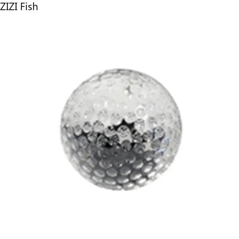 Silver minimalist textured glass crystal ball desk decoration with dimpled surface and reflective finish