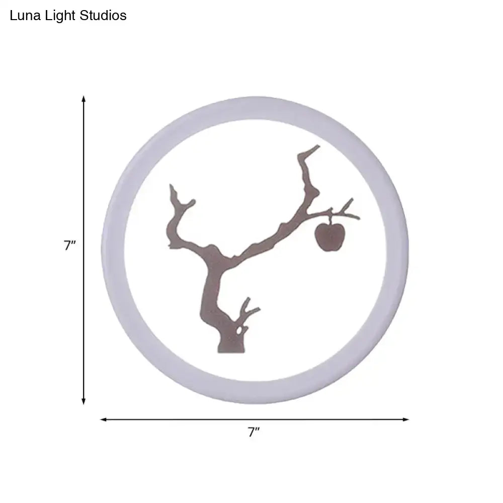 Minimalist 12 inch fixture circular wall lamp with matte gray metal frame and tree branch cutout for bedroom use