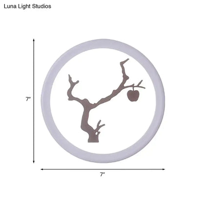 Minimalist 12 inch fixture circular wall lamp with matte gray metal frame and tree branch cutout for bedroom use