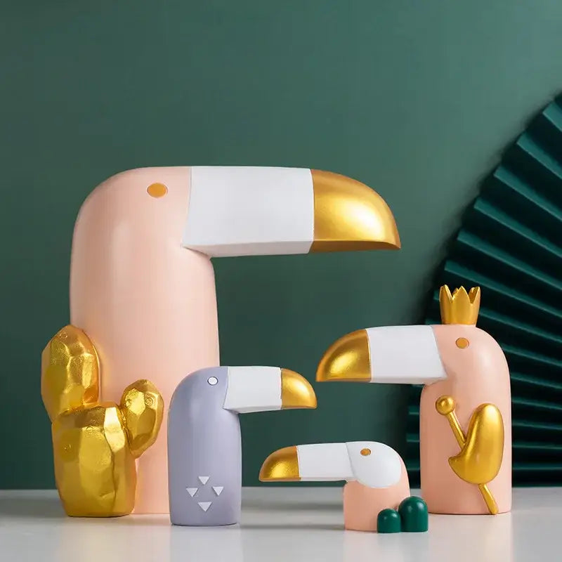Minimalist turquoise and gold decorbites bird figurine office phone holder with pastel pink and gold toucan design and glossy finish