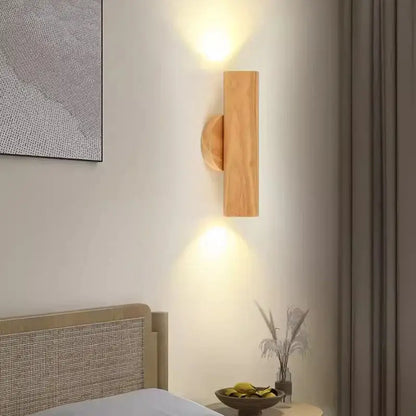 Minimalist walnut and natural led wood wall lamp with light wood finish and circular base by decorbites led wood wall lamp
