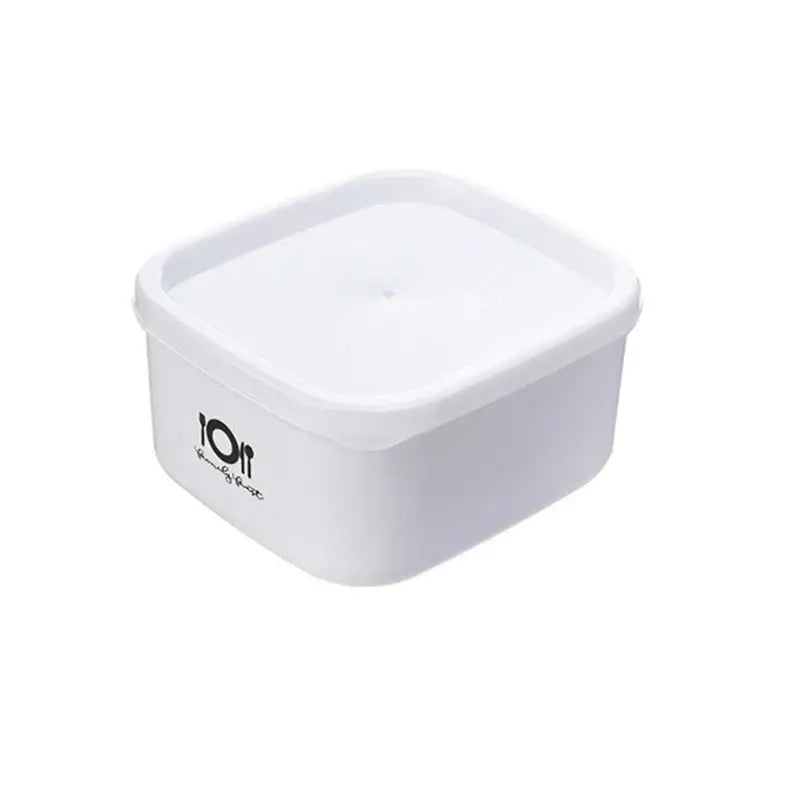 Minimalist white plastic bento box with matching lid and black decorbites bento box logo for food storage