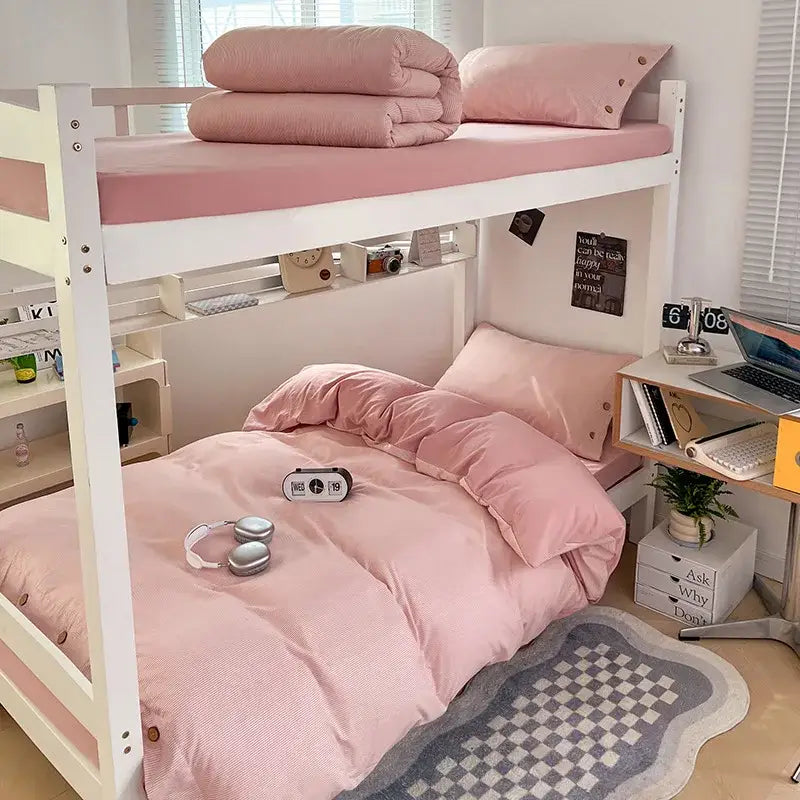 Pink bunk bed with white frame featuring decorbites buttoned washed cotton bedding set in minimalist style