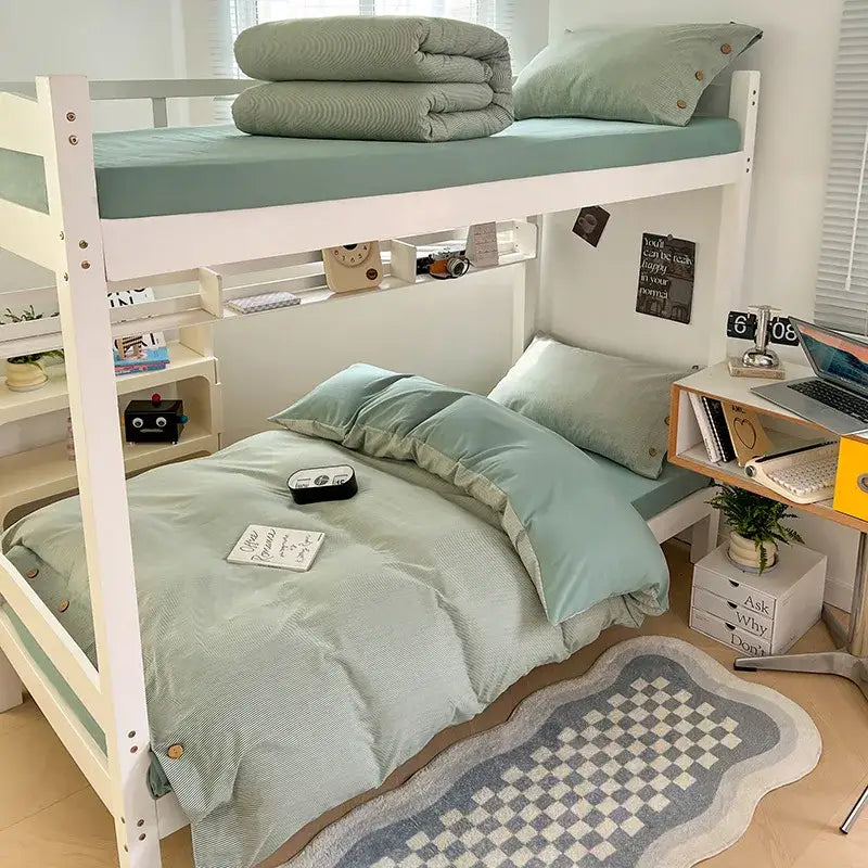 White wooden bunk bed with mint green decorbites buttoned washed cotton bedding set and matching pillows