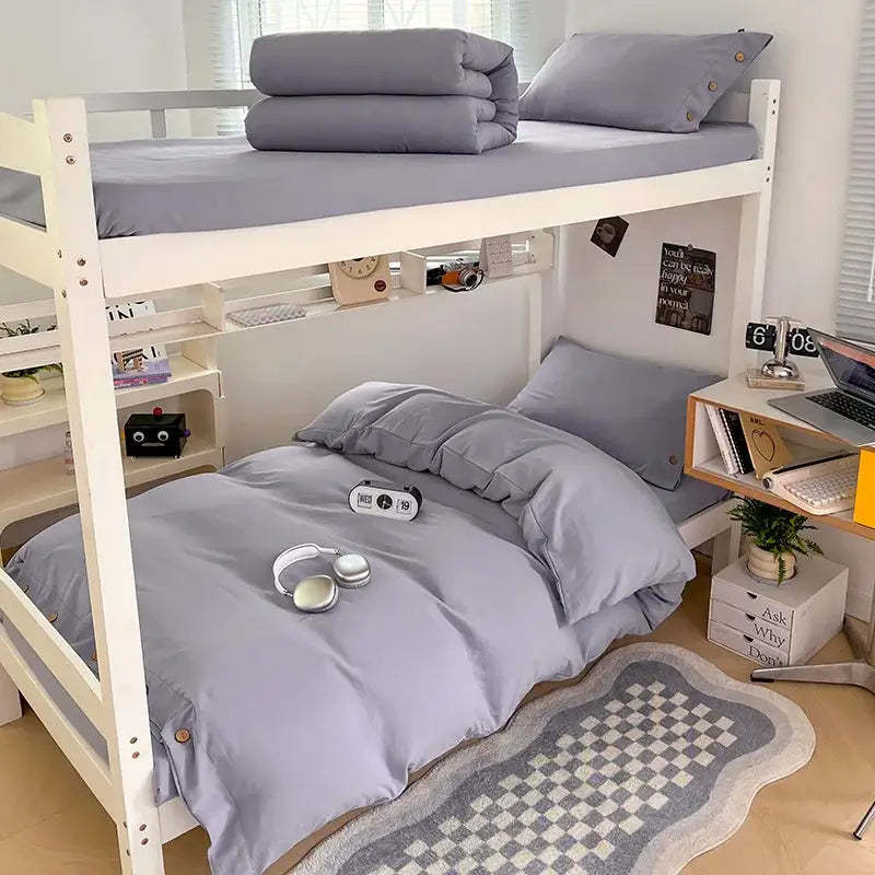 Gray bunk bed with a minimalist white buttoned washed cotton bedding set by decorbites for modern bedroom decor