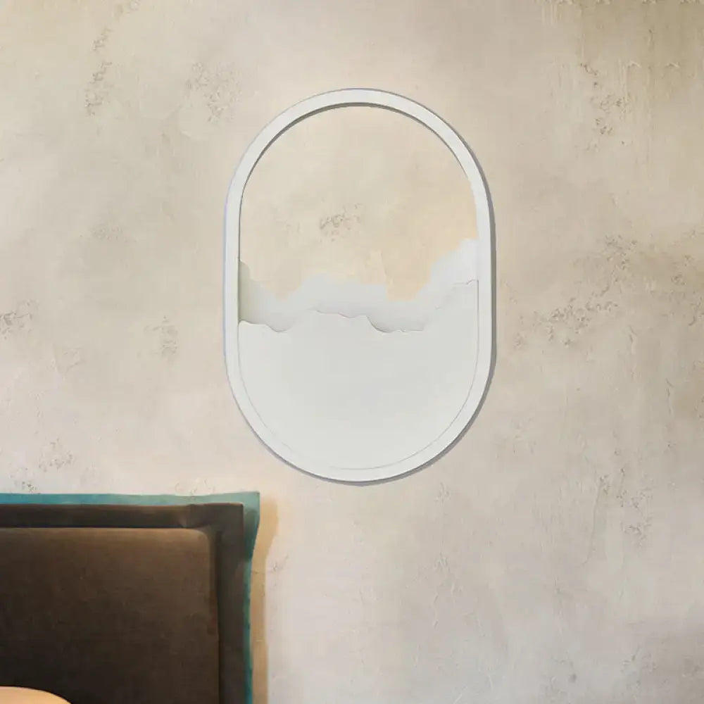 Oval-shaped white minimalist wall sconce mirror with cloud-like cutout design suitable for 220v-240v 110v-120v wall lamp use