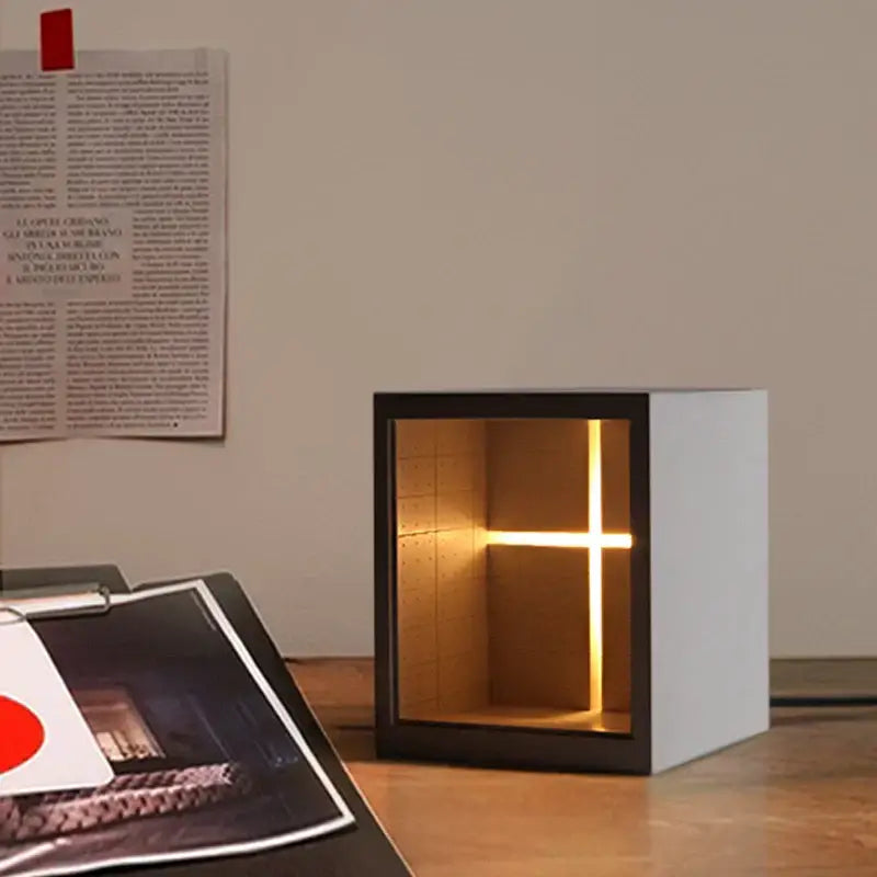 Minimalist white concrete church table lamp with black frame and cross light fixture by decorbites concrete church decor