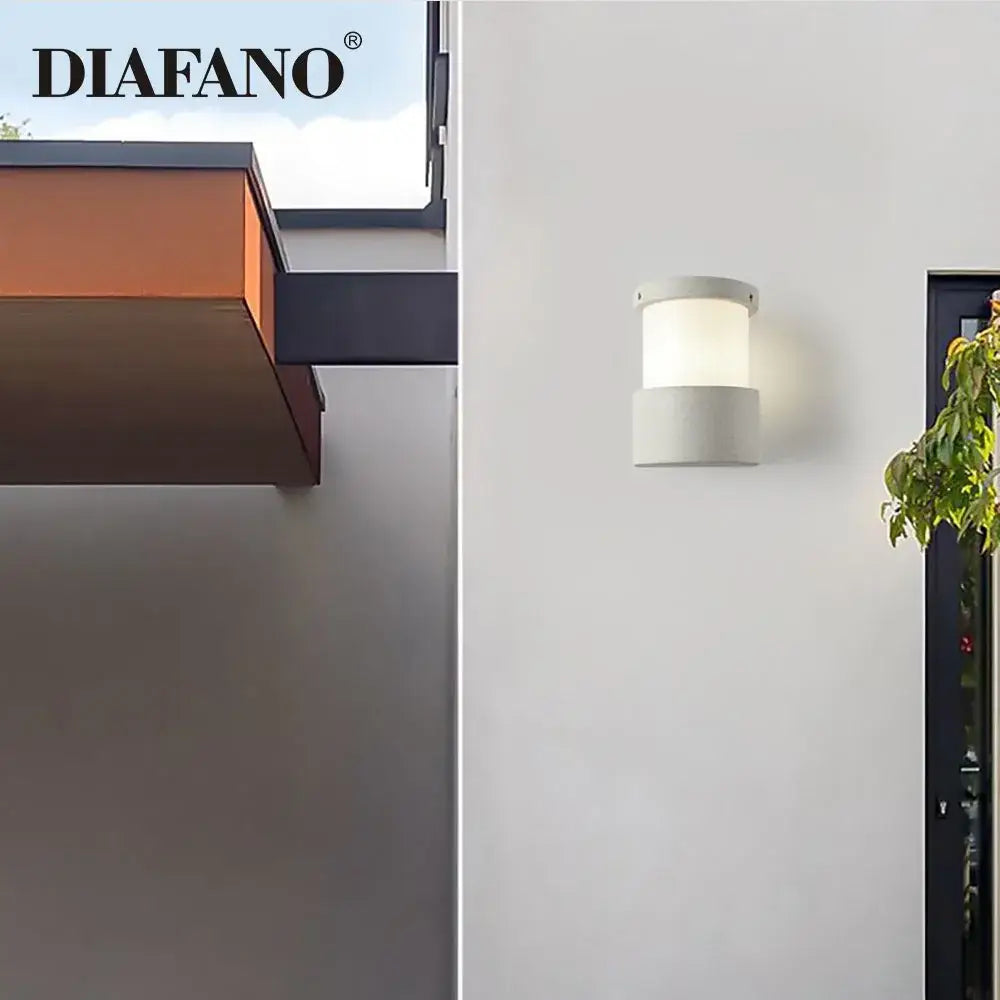 Minimalist white concrete outdoor wall lamp with frosted glass diffuser as decorbites concrete outdoor wall lamp