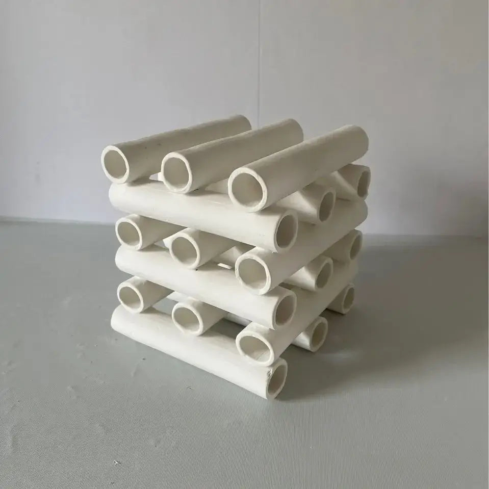 White ceramic geometric ceramic pipe decorative figurines with stacked interlocking design for minimalist living room decorbites decor