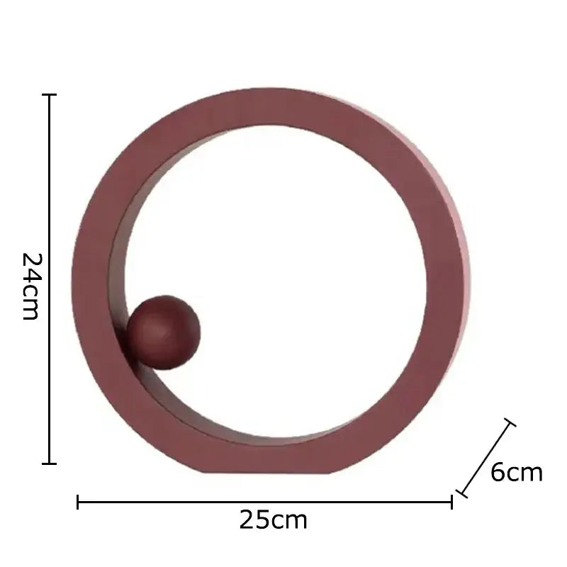 Minimalist white geometric circle desk ornament in matte terracotta finish with a small sphere center decorbites geometric circle