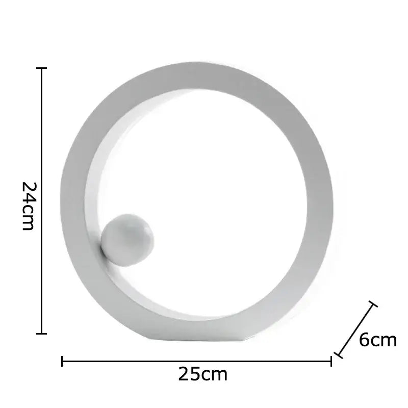Minimalist white geometric circle desk ornament with a small sphere inside for modern office decor by decorbites geometric circle