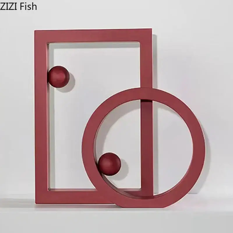 Red minimalist geometric circle desk ornament with two spherical accents for modern office decorbites geometric circle decor