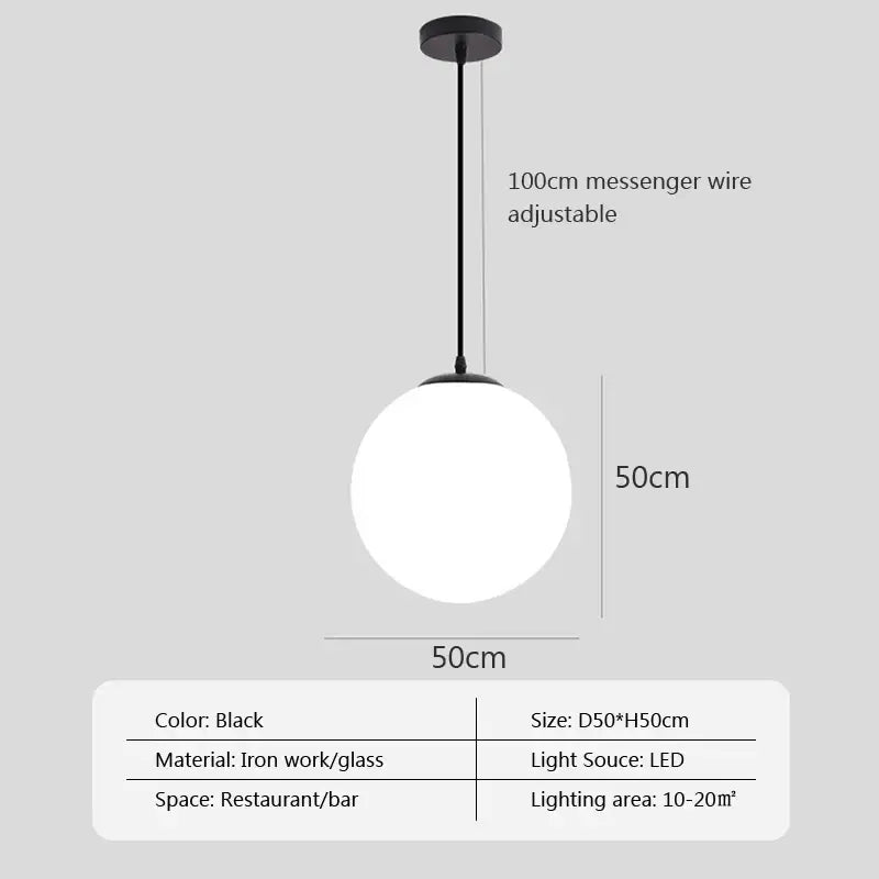 Minimalist black glass ball pendant light with matte ironwork fixture and frosted globe for modern dining decorbites pendant lights