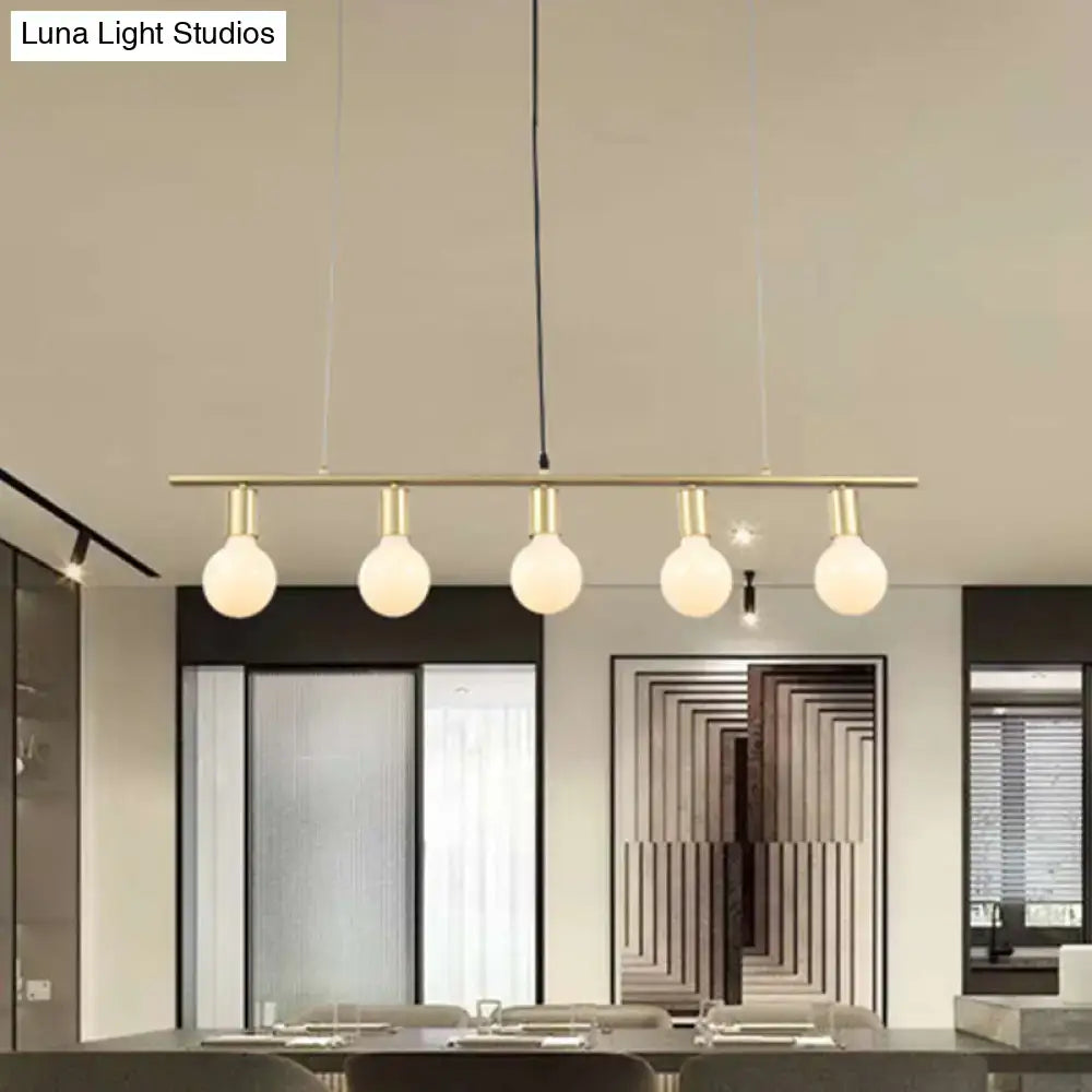 Modern brass bar pendant light with five frosted glass globes for minimalist white gold linear metal island lighting