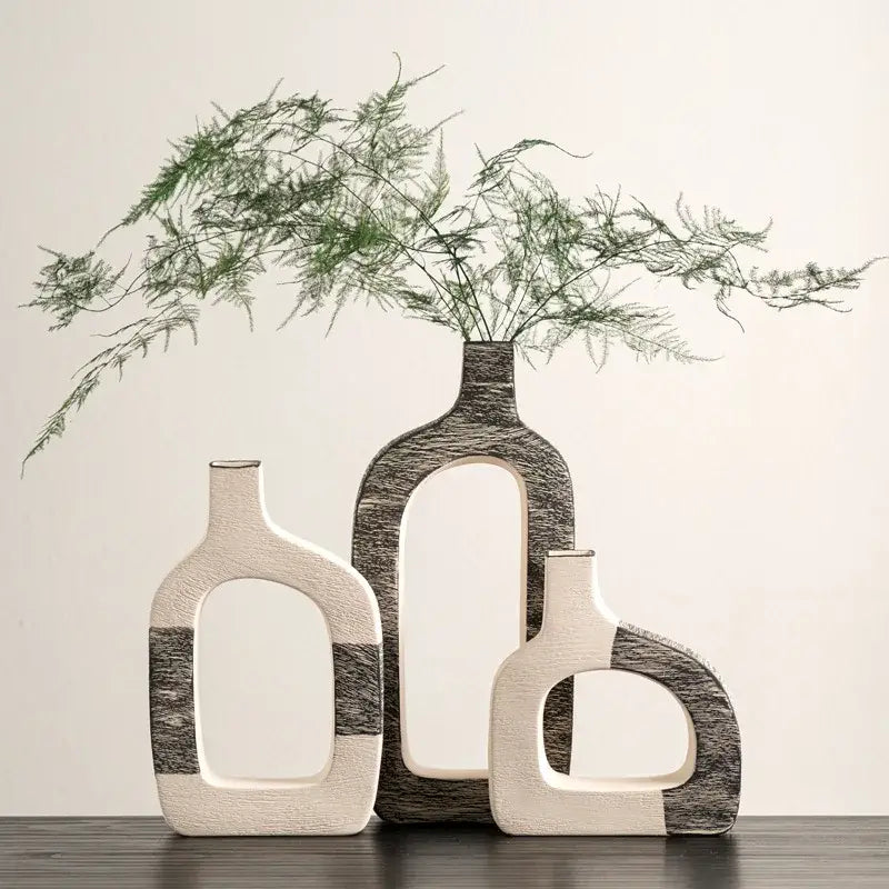 Three modern ceramic flower vases with minimalist white and dark gray geometric stripes for living room decor