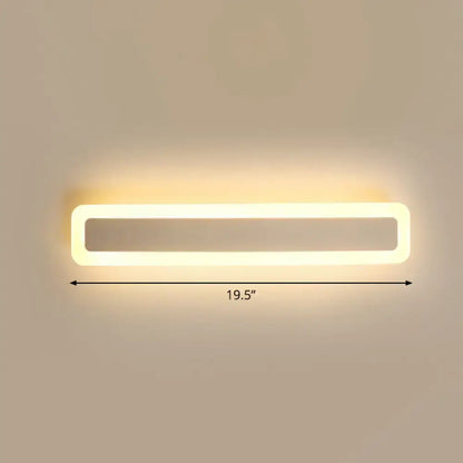 Modern rectangular led wall sconce with a sleek white frame and warm third quality light for vanity light use