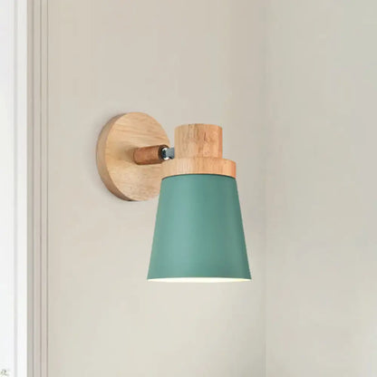 Teal cone-shaped wall lamp sconce with natural wood base and mounting plate for minimalist living room decor