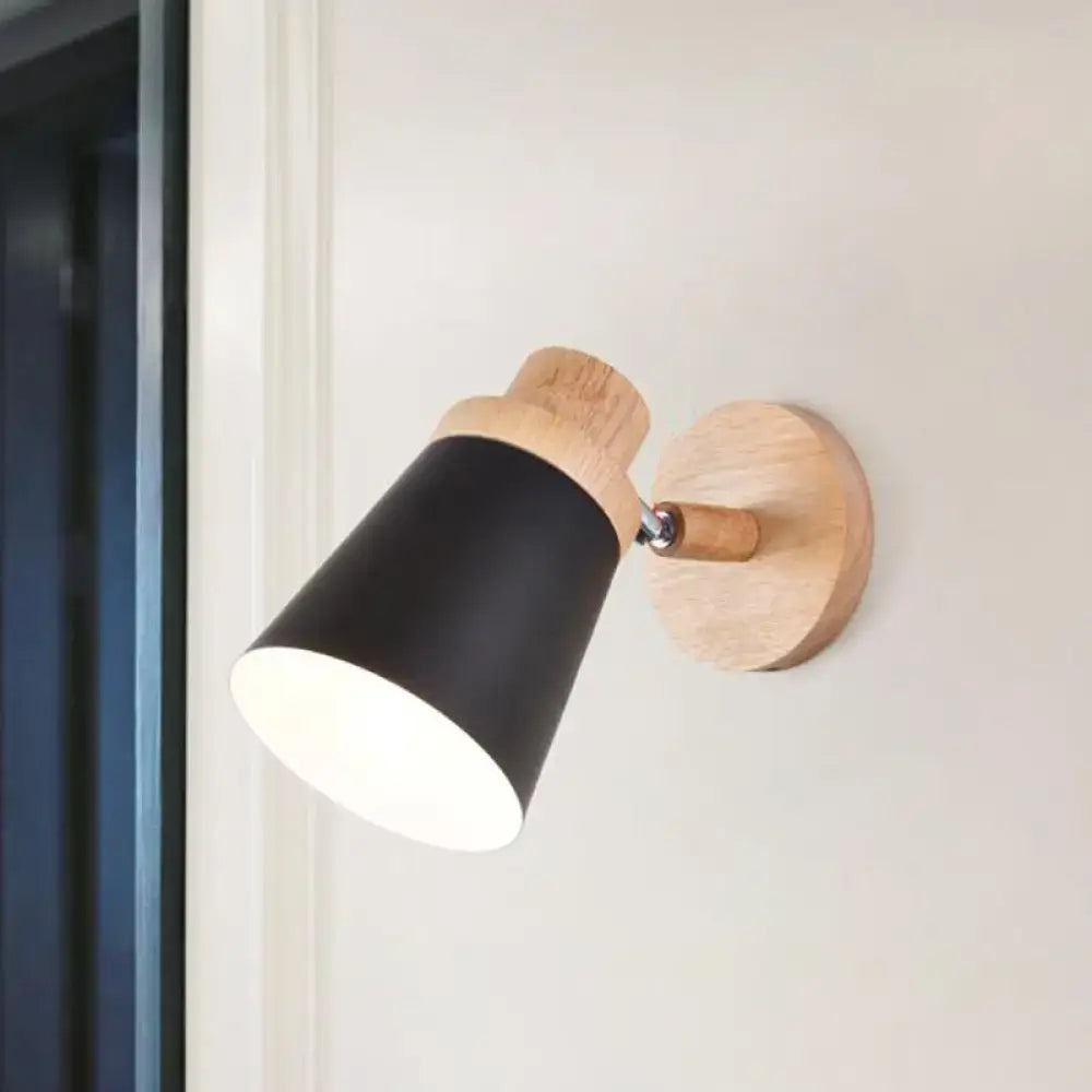Black matte conical wall lamp with wooden accents mounted on light wood circular plate minimalist barrel wall lamp sconce