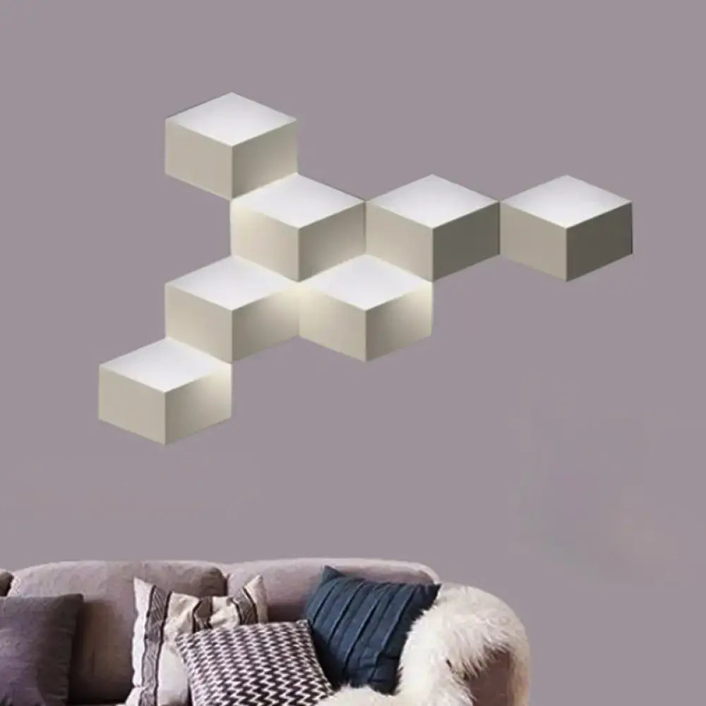 Minimalist white metallic geometric wall lamp with interconnected cube design for modern corridor lighting