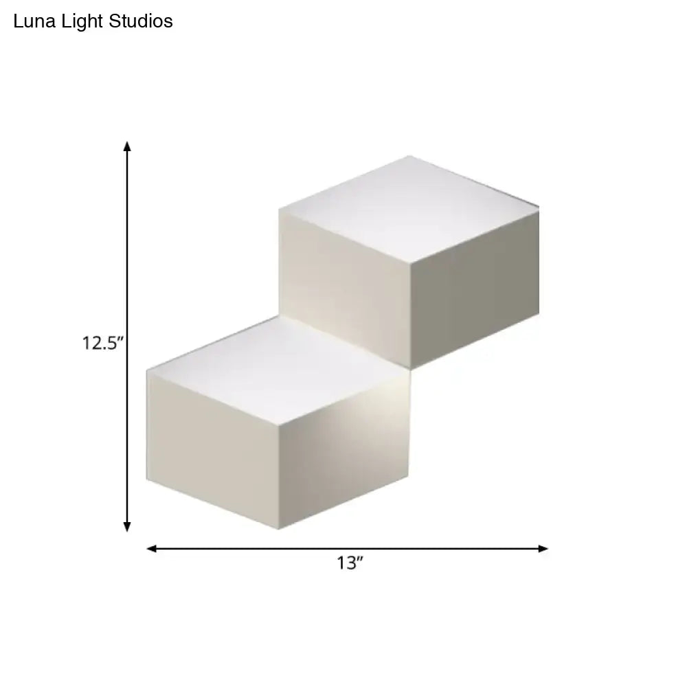 White minimalist step stool with clean lines and matte finish complementing metallic geometric wall lamp for corridor