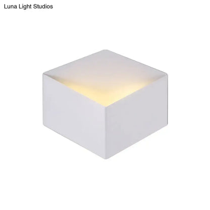 Minimalist white metallic geometric wall mount wall lamp with cube-shaped led night light and warm interior glow for corridor