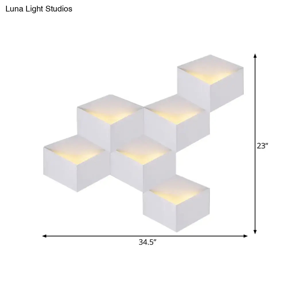 Minimalist white metallic geometric wall mount wall lamp with cube-shaped led light module and warm yellow illumination