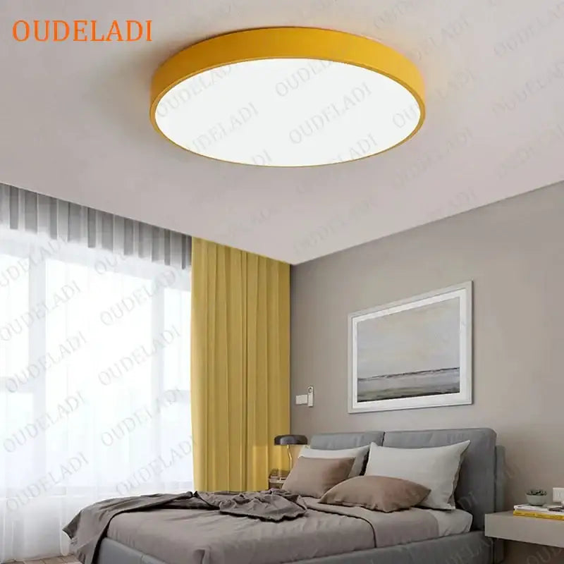 Yellow circular ceiling light with modern design and soft white illumination for decorbites colorful round led bedroom decor