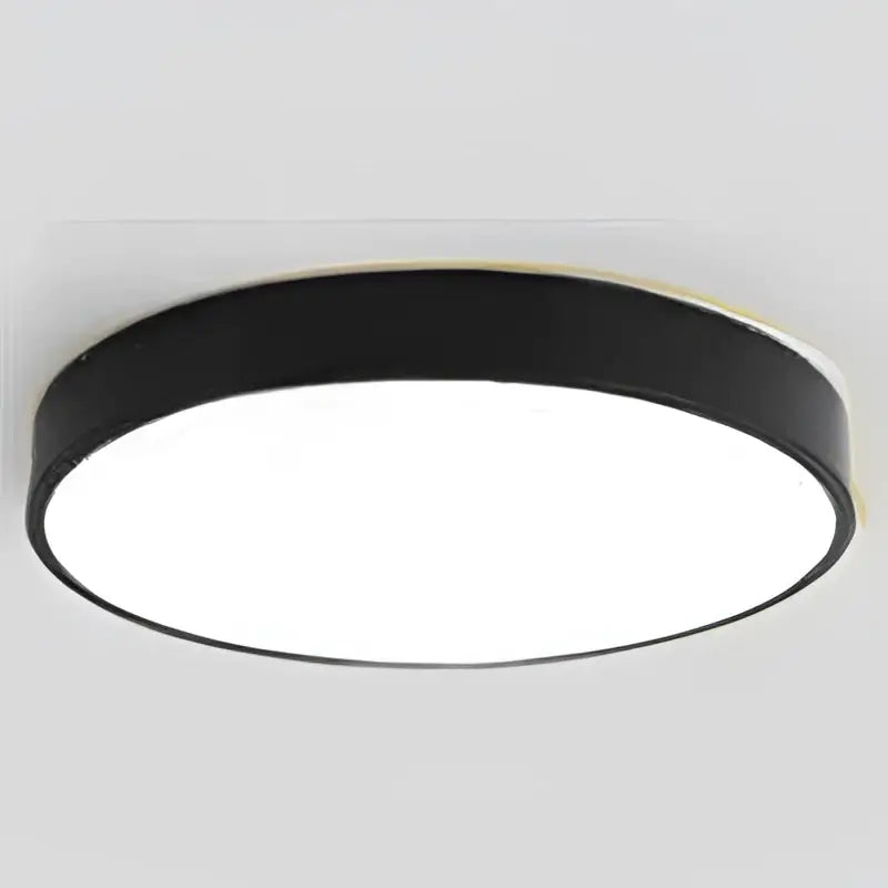 Black circular ceiling light with sleek modern design and smooth matte finish for decorbites colorful round led bedroom decor