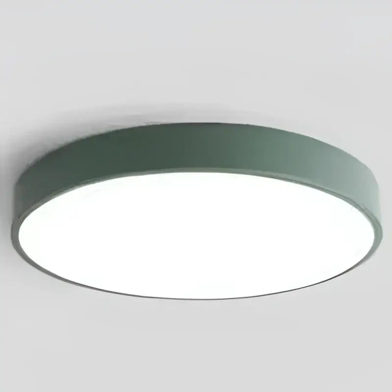 A sleek matte dark green frame colorful round led ceiling light with bright white surface for bedroom decorbites ceiling light